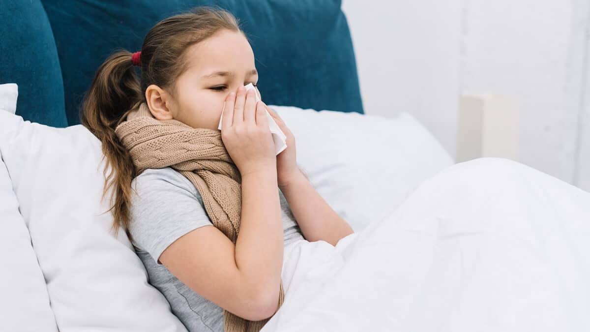 Girl with flu cold using colloidal nano silver